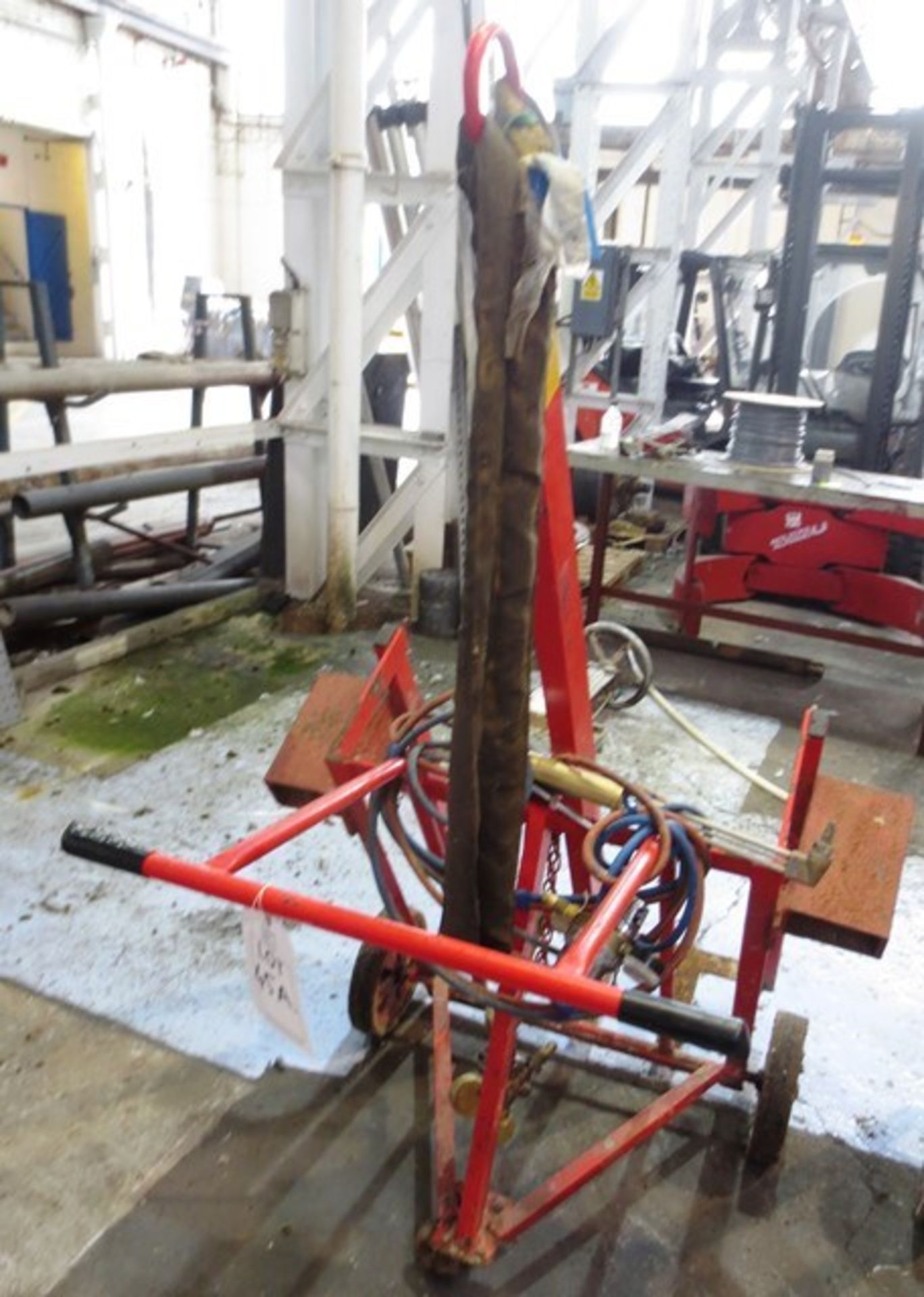 Un-named twin bottle welders transport trolley with regulator and welding torch