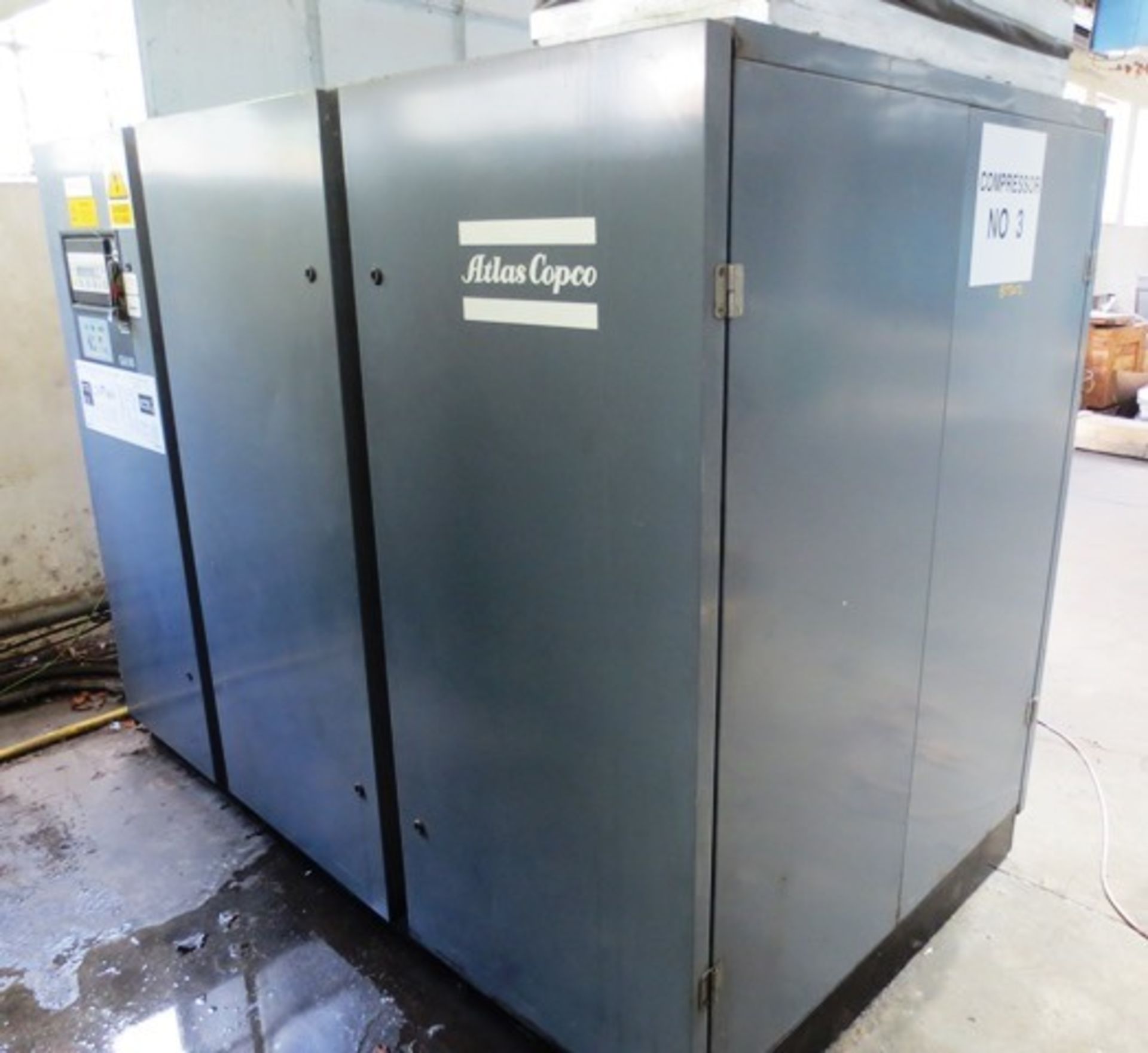 Atlas Copco GA90 packaged air compressor, s/n: AIF.039721 (1997), Rec. hours circa 146,050, Max