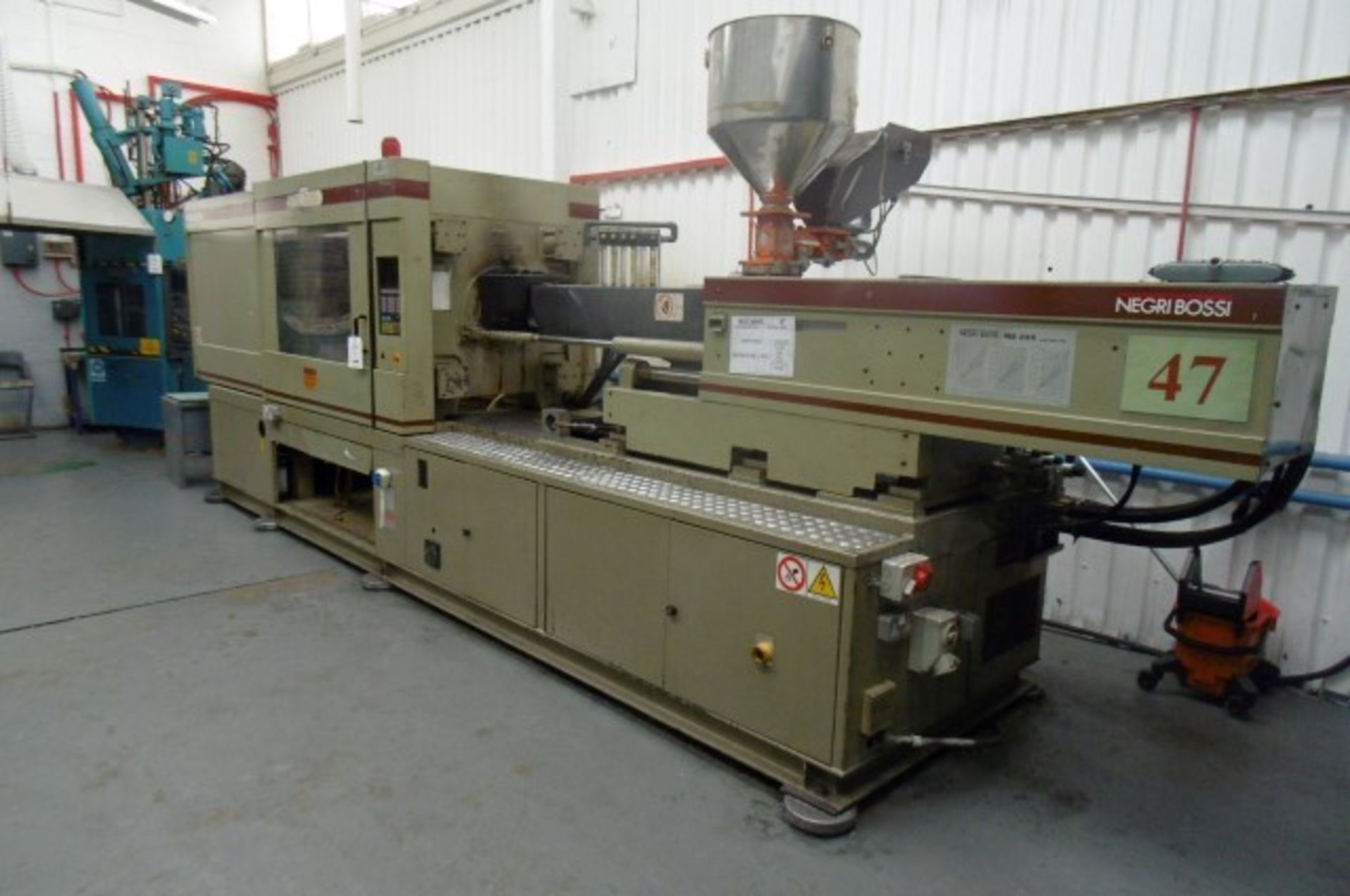 Negri Bossi NB330 horizontal plastic injection moulding machine Serial Number: 54-374 with