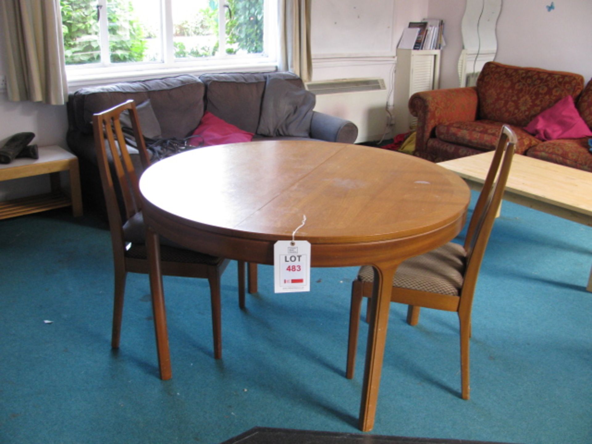 Remaining Contents of room to include: round wooden dining table, three various sofas, coffee table,