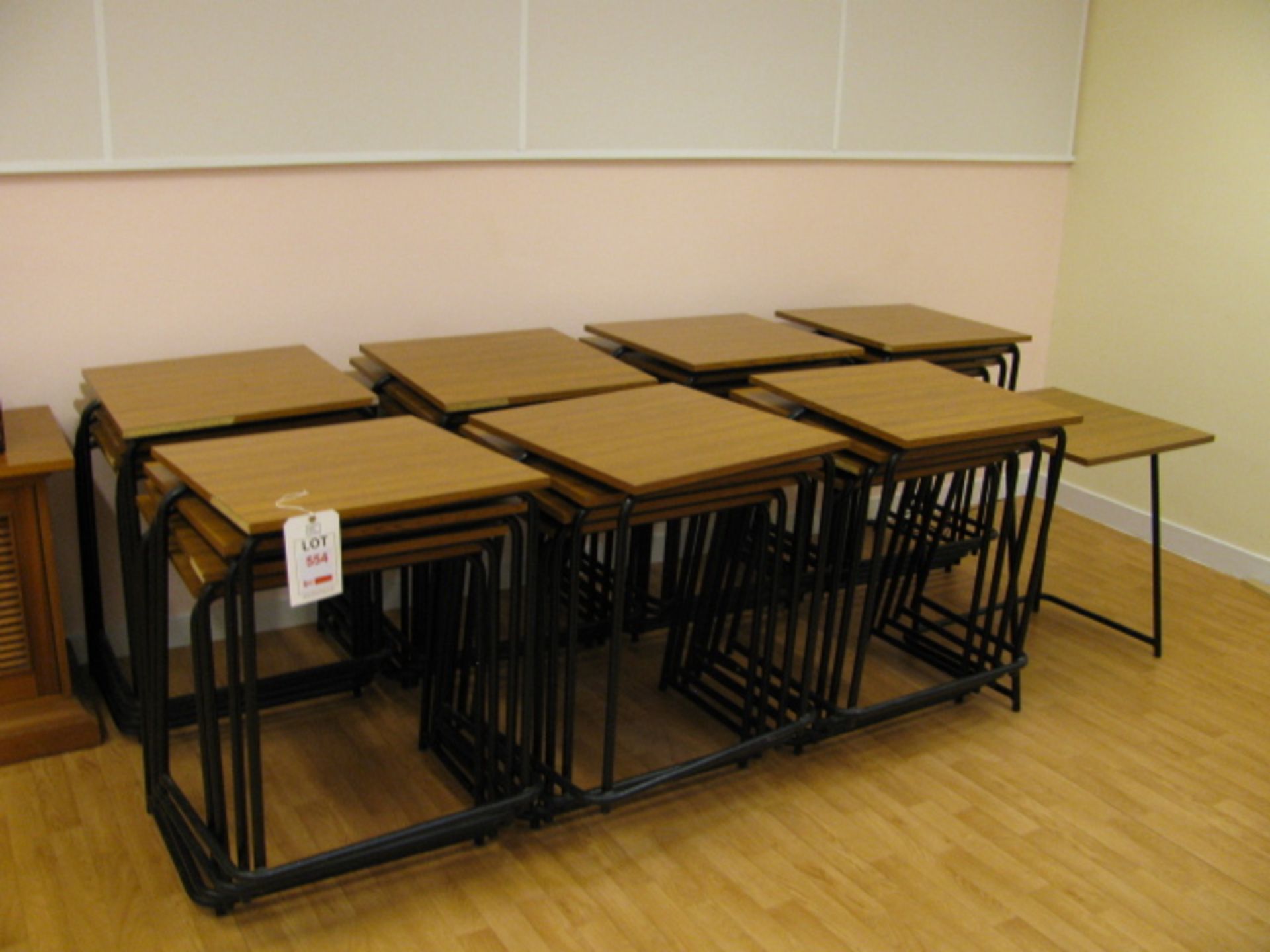 Twenty nine Sapele square stacking exam desks