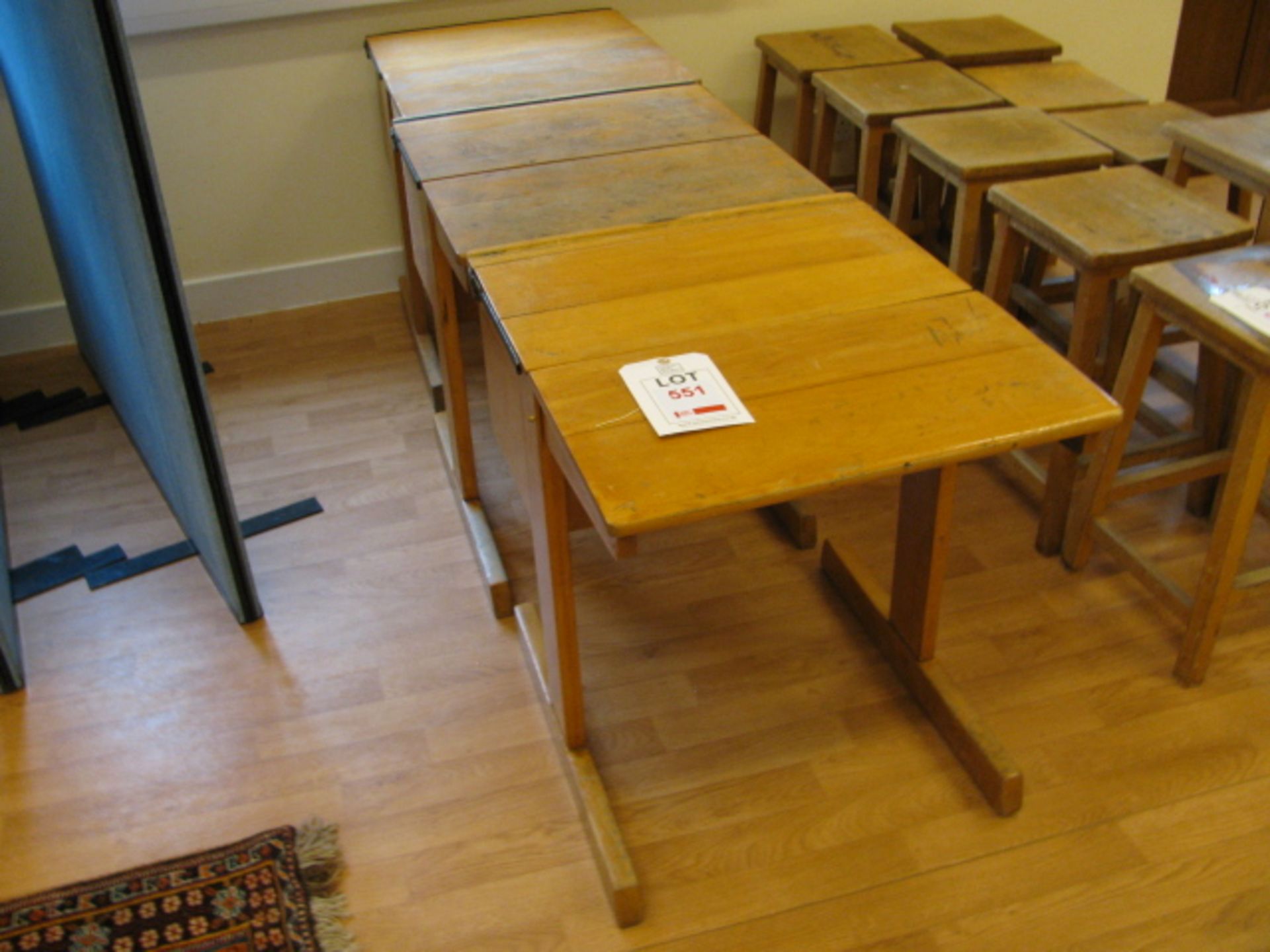 Three traditional wooden flip top desks