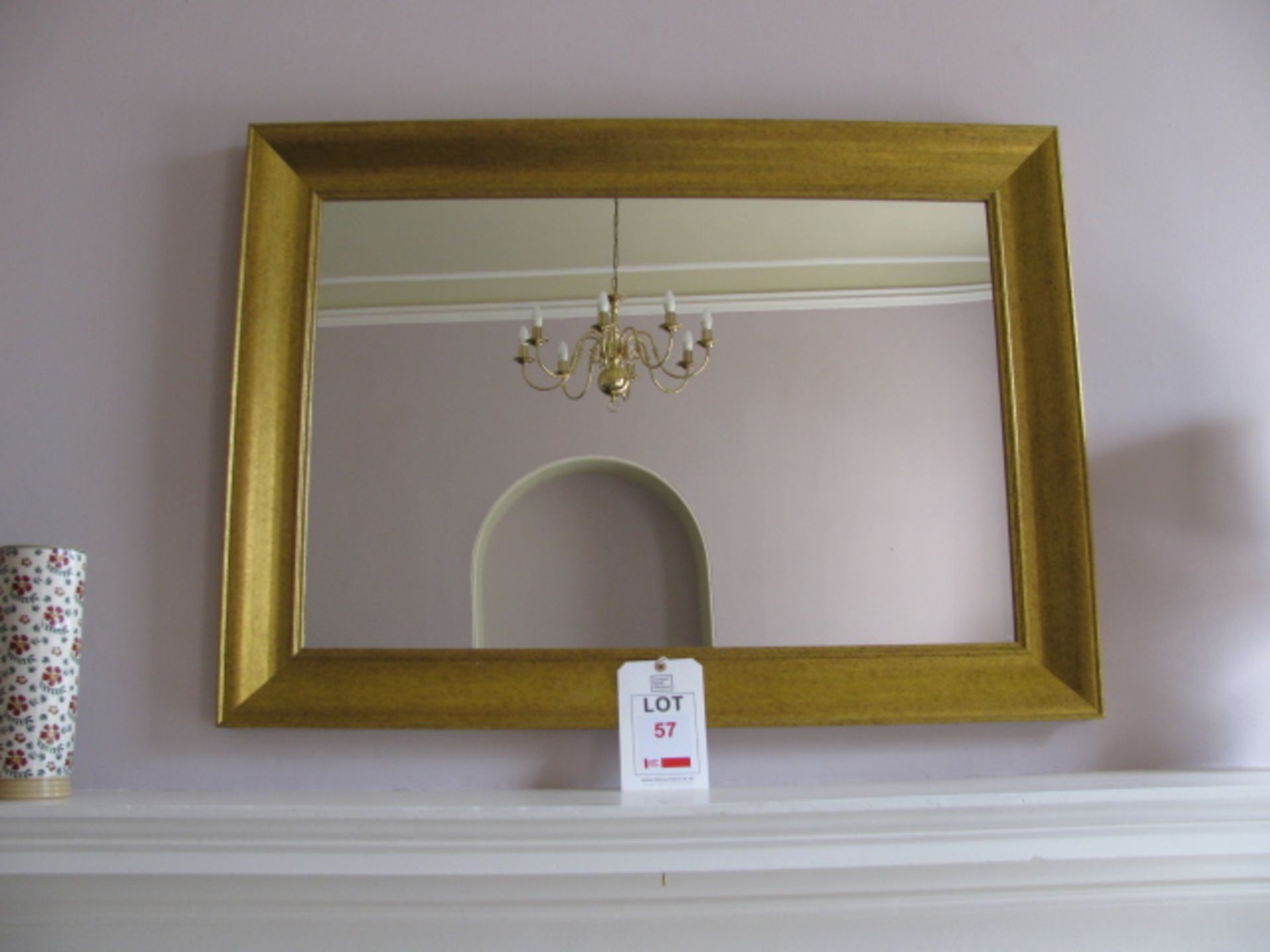 Gold framed mirror and three framed prints