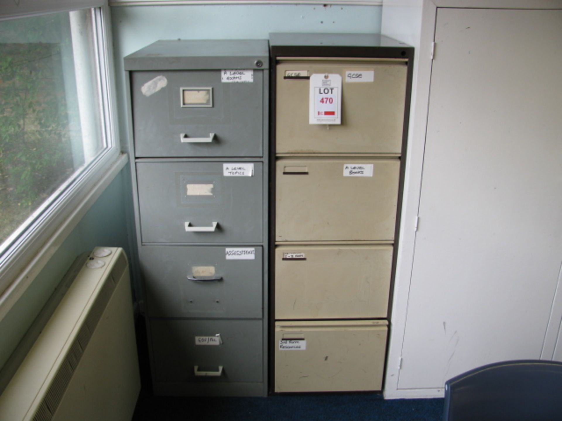 Two steel 4 drawer filing cabinets