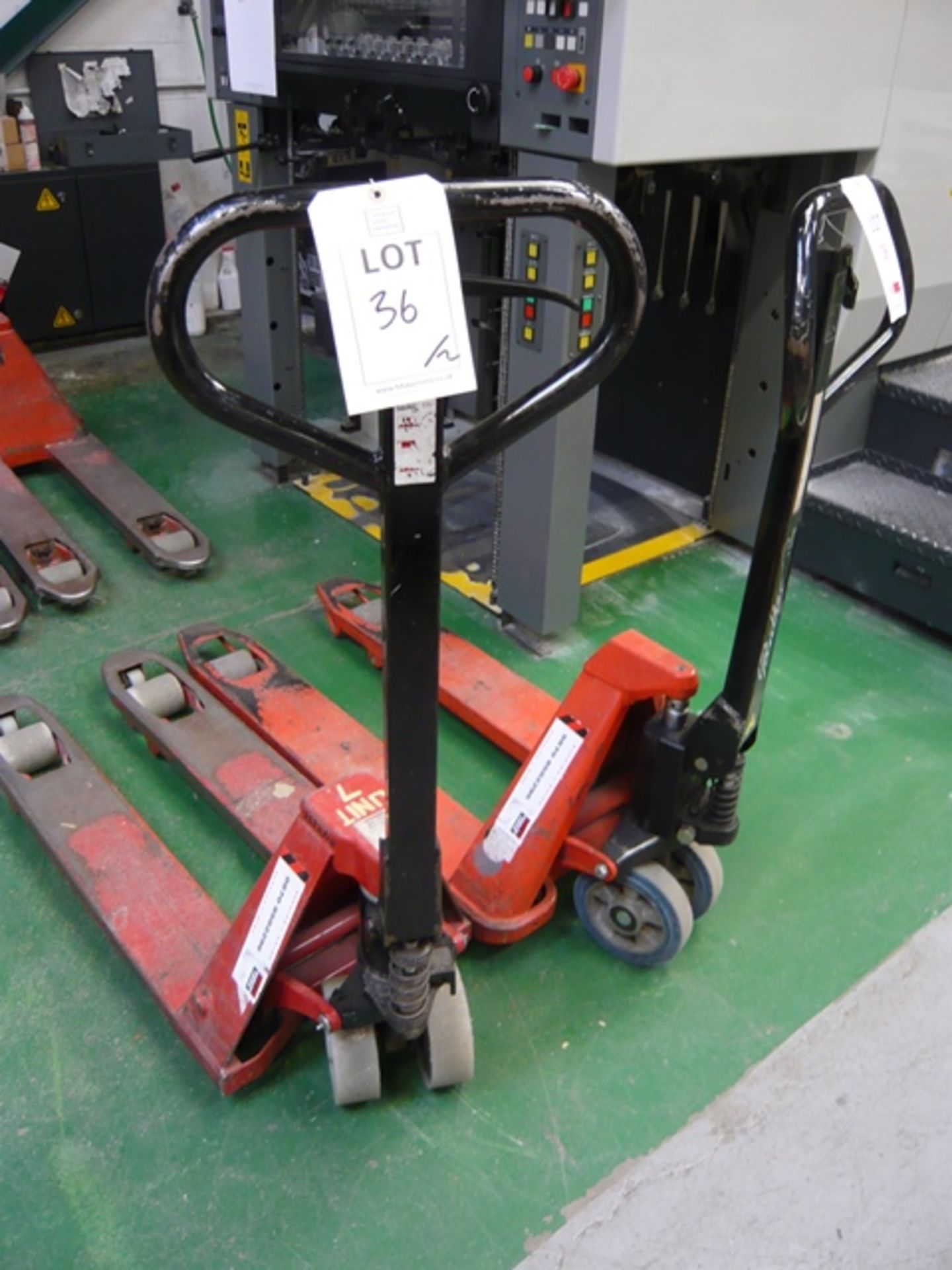 2 various pallet trucks