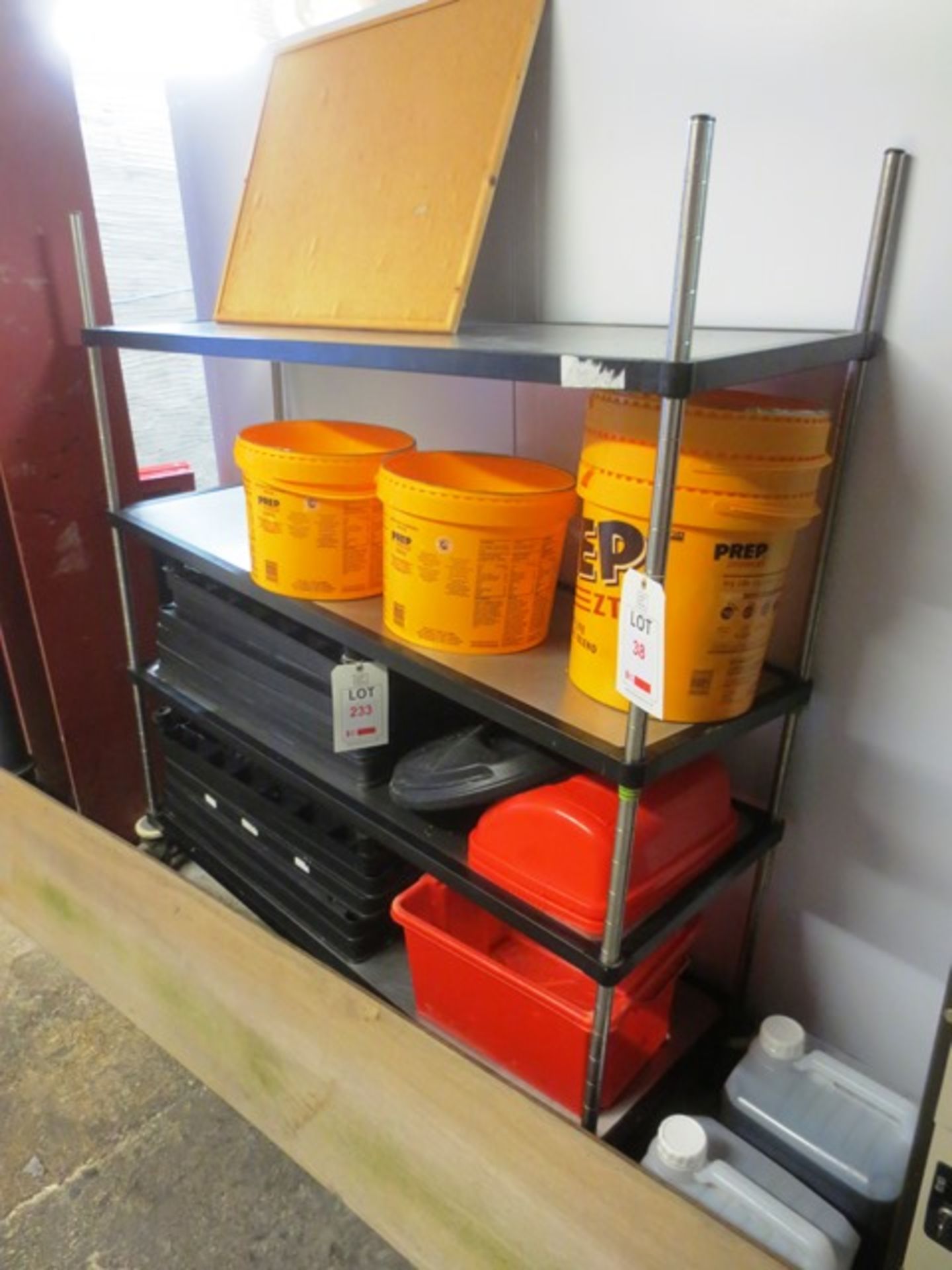 Two 4 tier, adjustable mobile storage racks (excludes contents) (only one in picture)