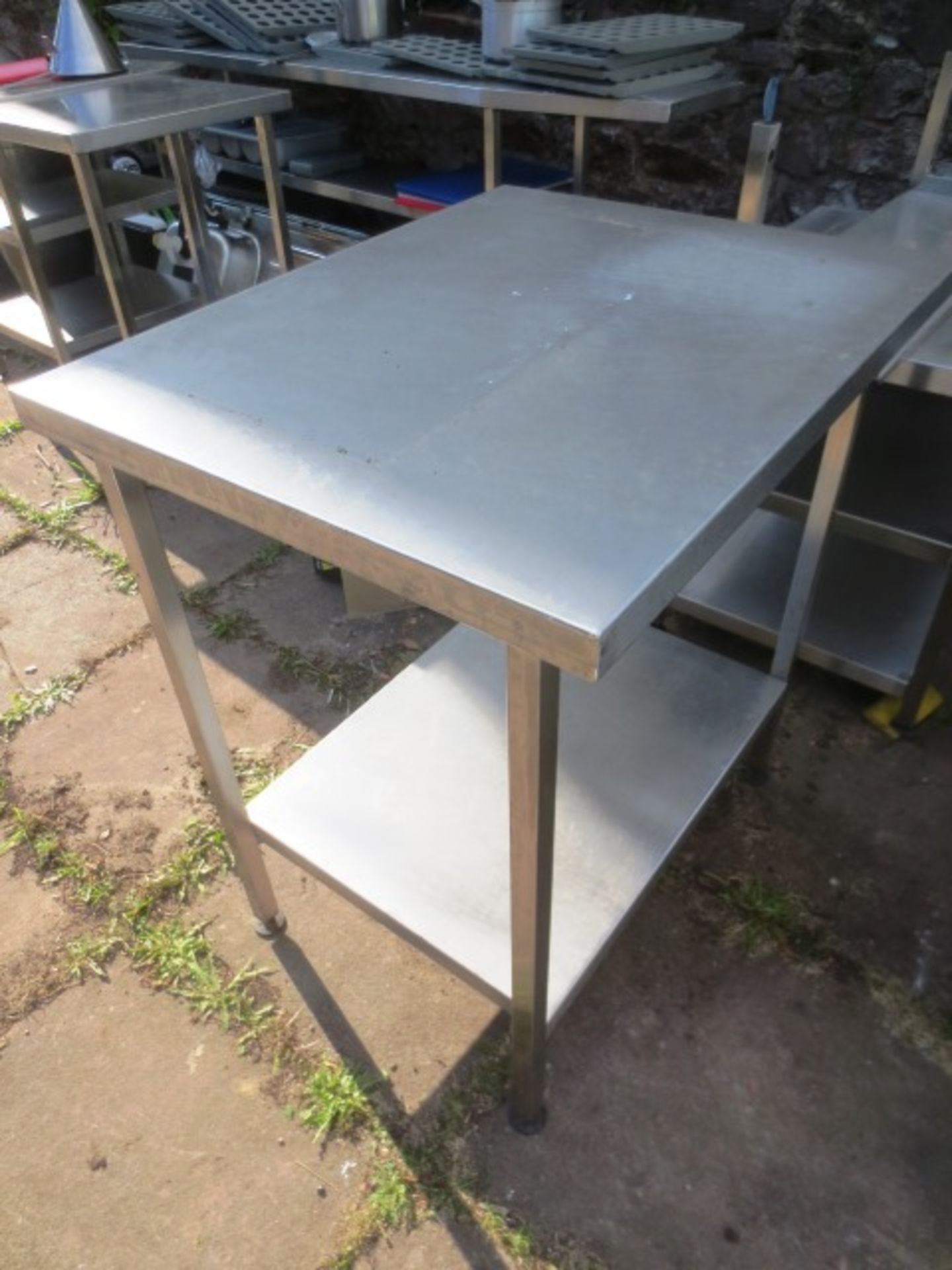 Stainless Steel table with single under counter shelve, approximate dimnesions: 820 x 650mm Please