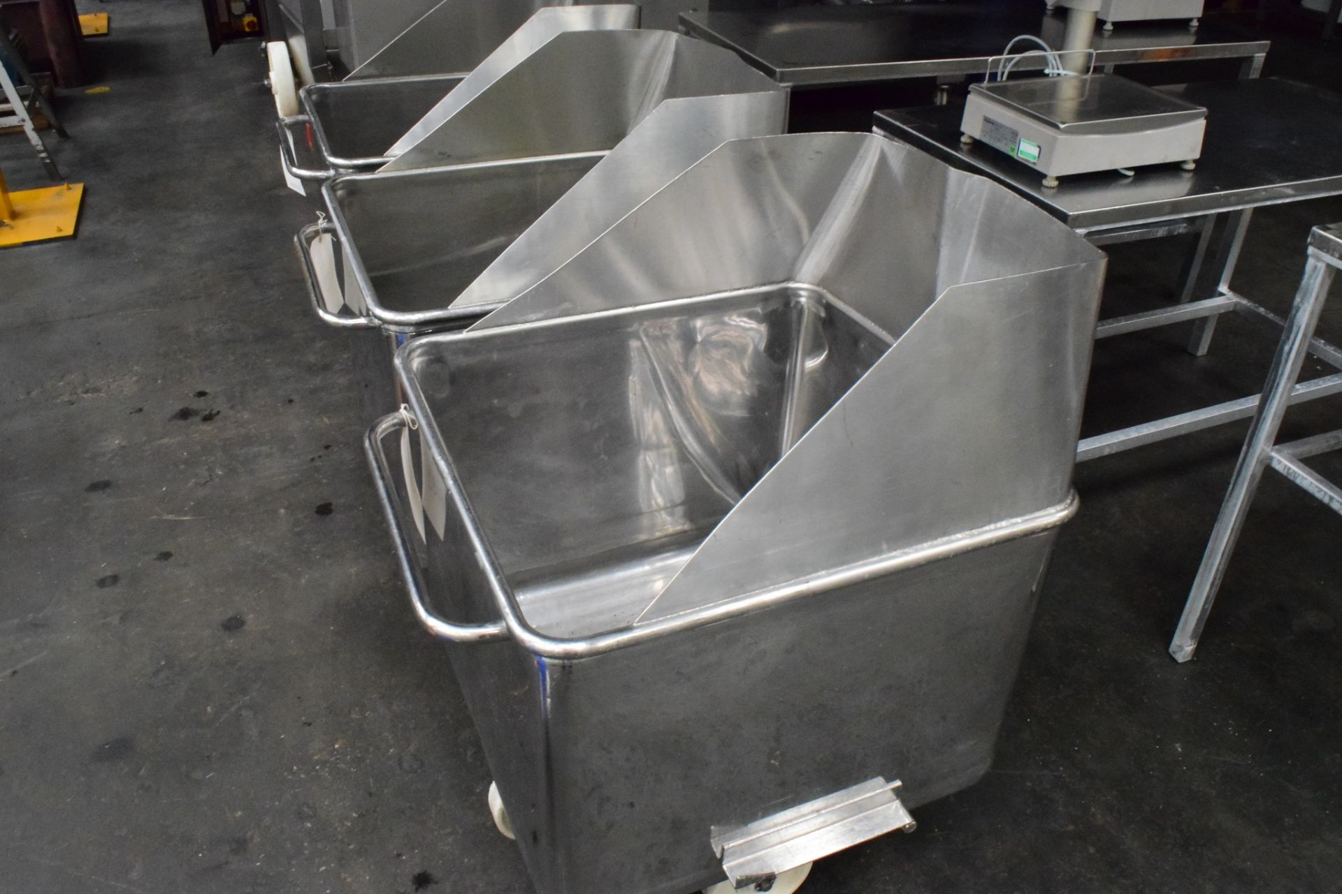 3 x stainless steel chuted tote bins, 200 litre units Lift out charge to be applied: £10 plus VAT