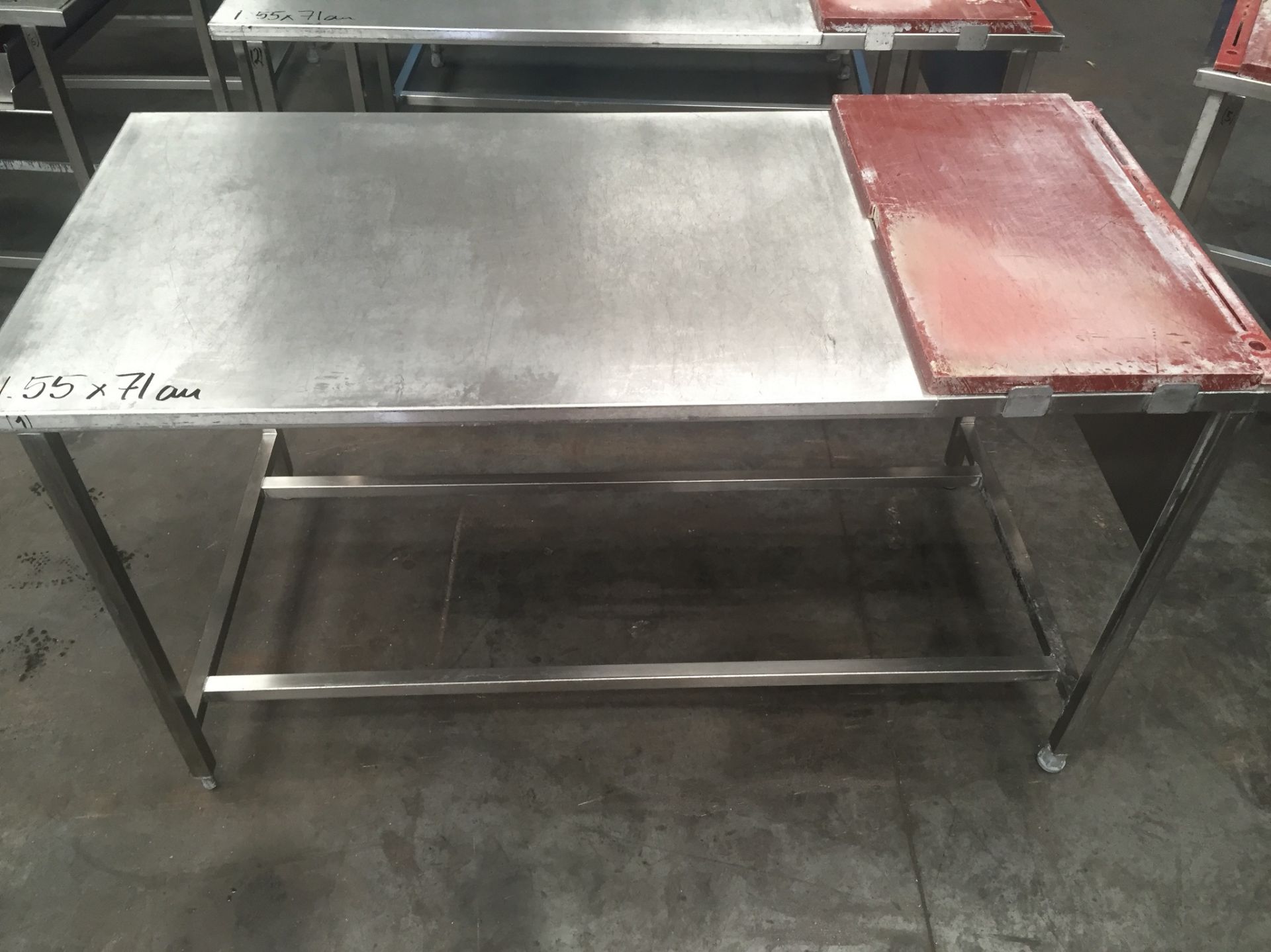 Stainless steel table with plastic chopping board measuring 380 x 700, with knife holder, overall