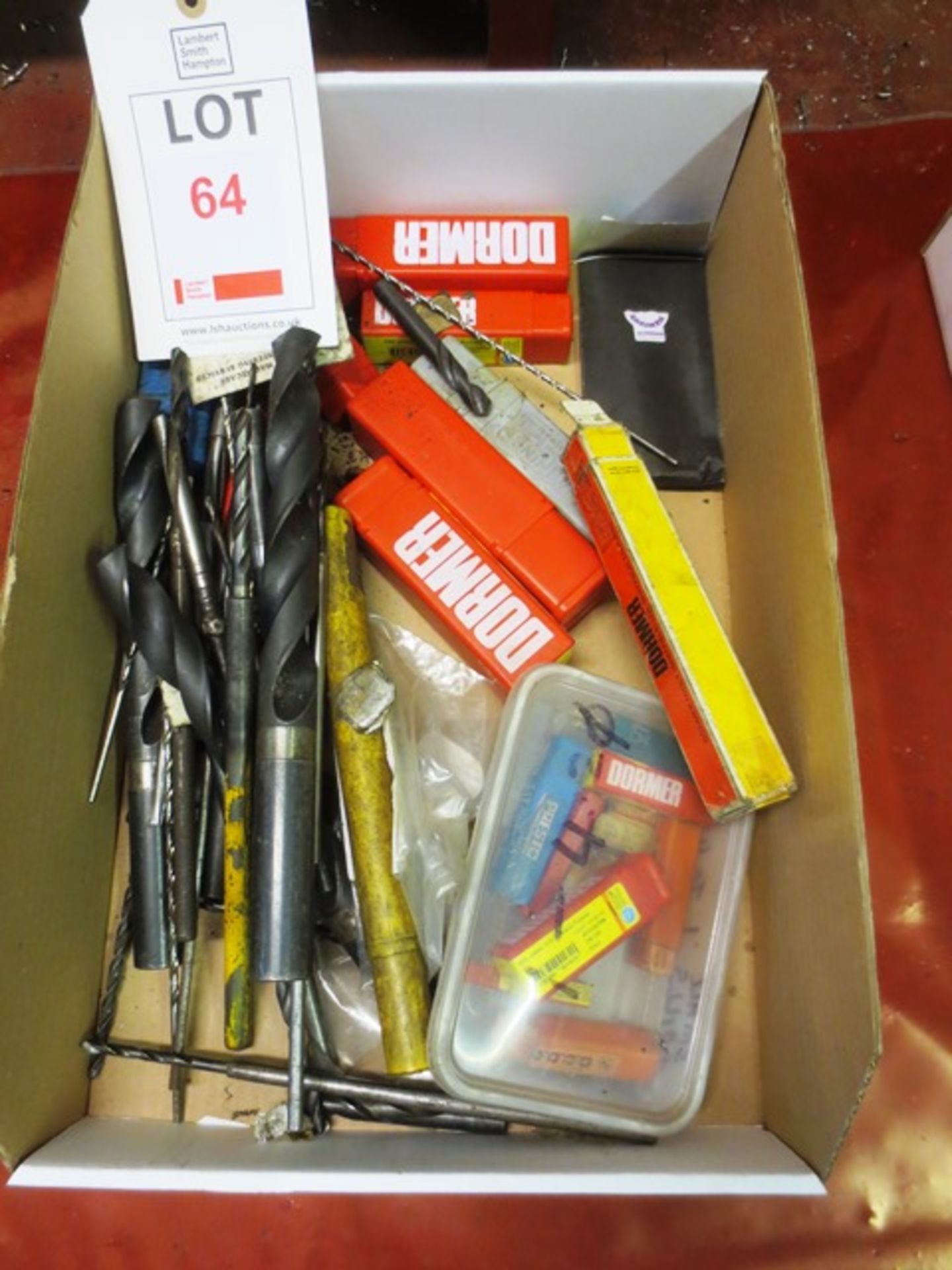 A box of assorted drill bits, long shank drill bits,etc.