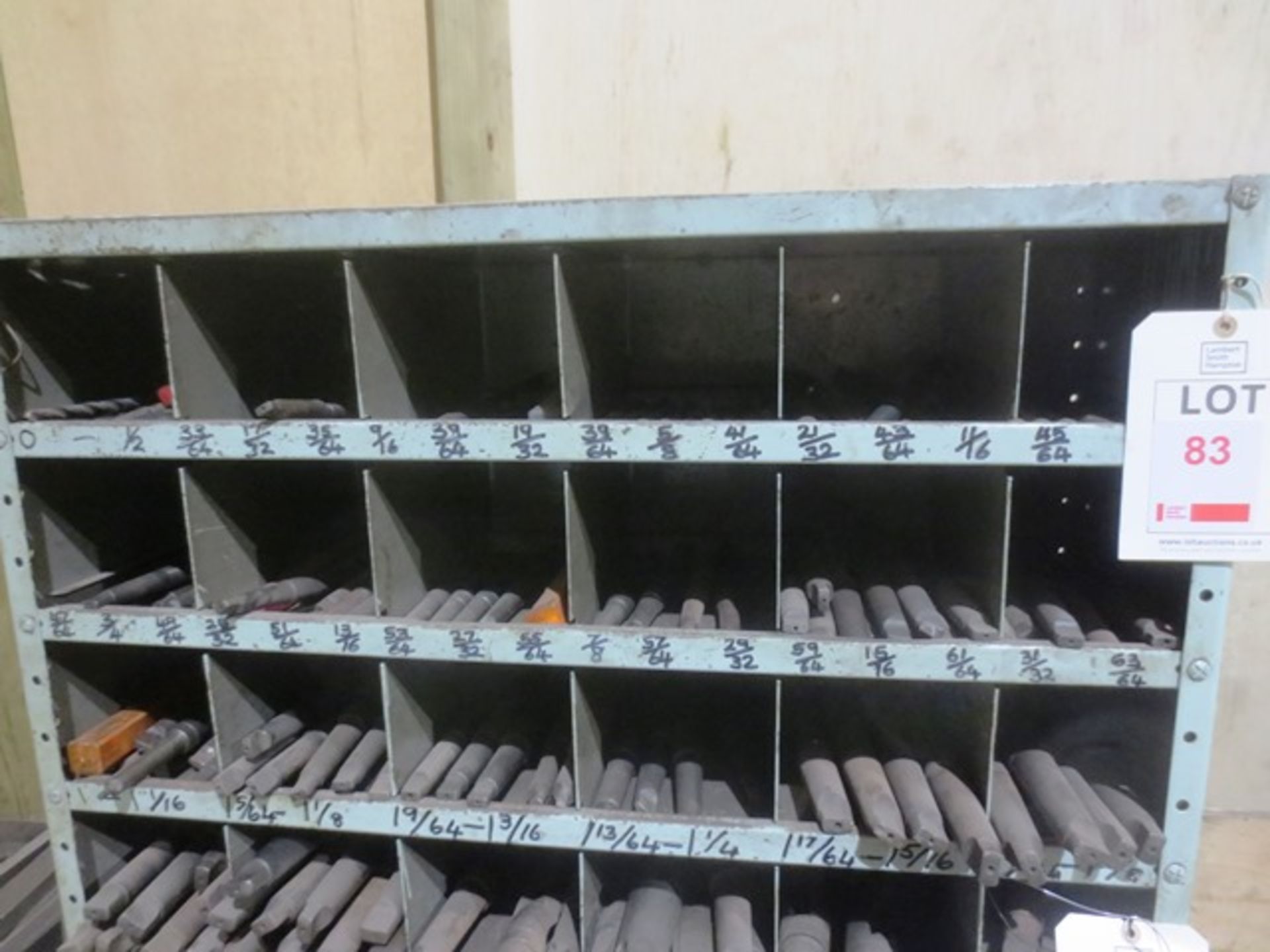 Contents of three shelves including various slot drills (0 - 13/8")