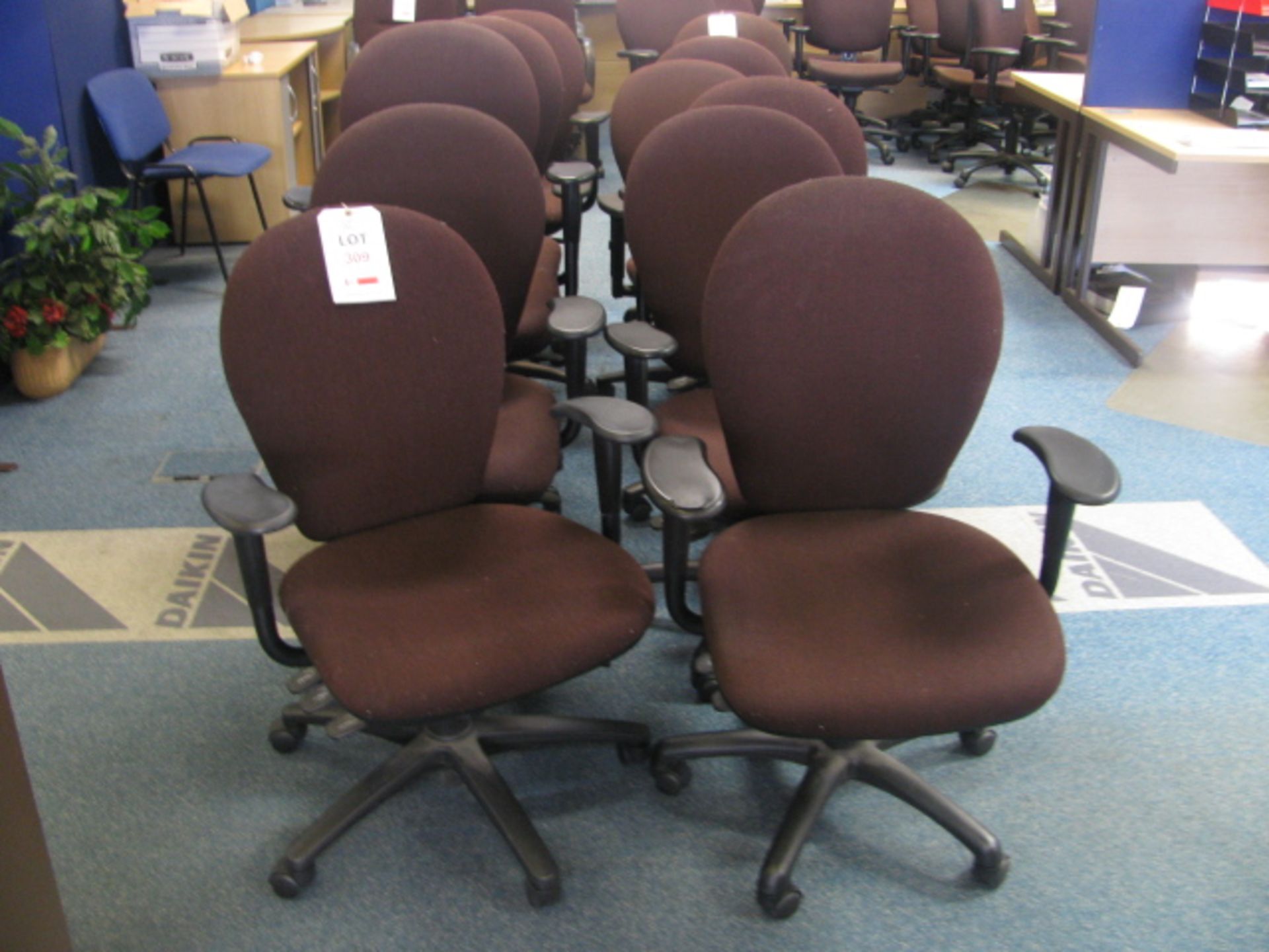 10 Brown fabric upholstered gas operated rev chairs