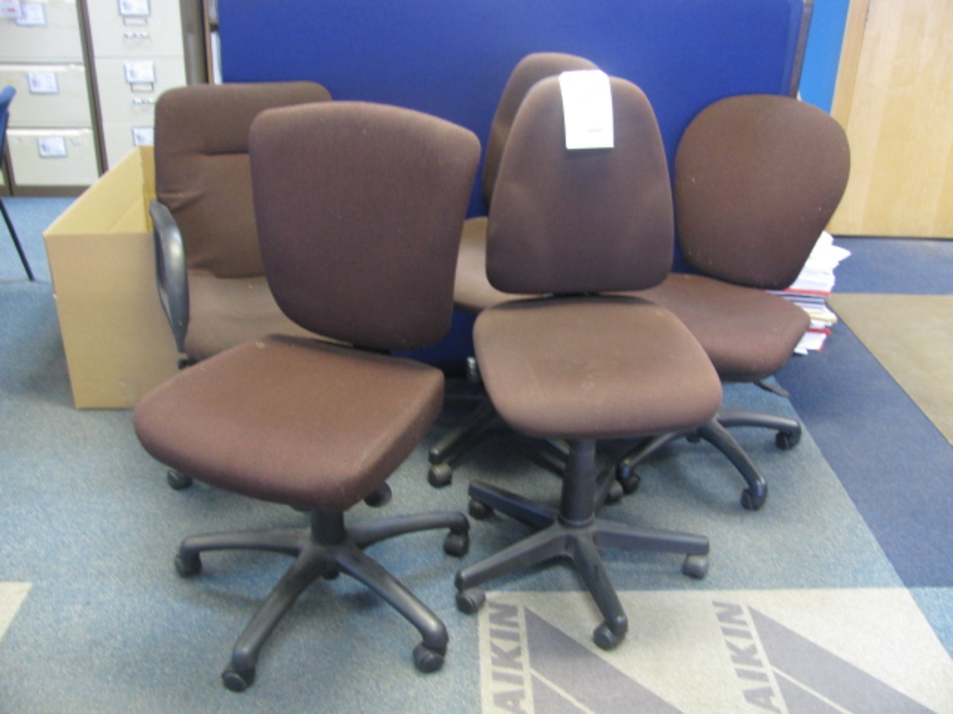 Five fabric upholstered gas operated chairs