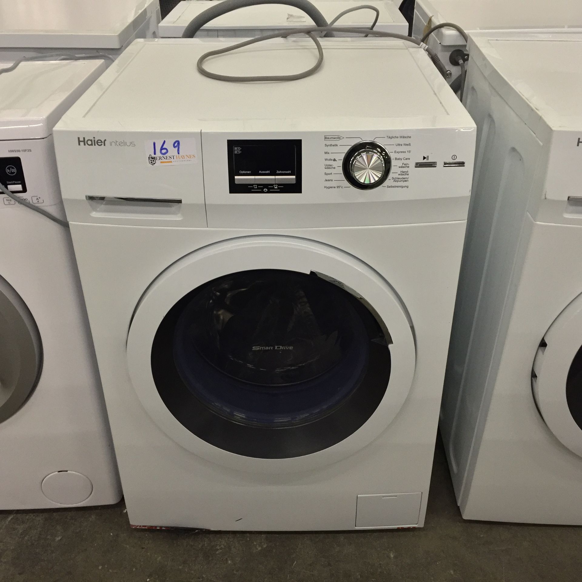 Haier Washing Machine, Powers up, looks unused, Transit bolts attached