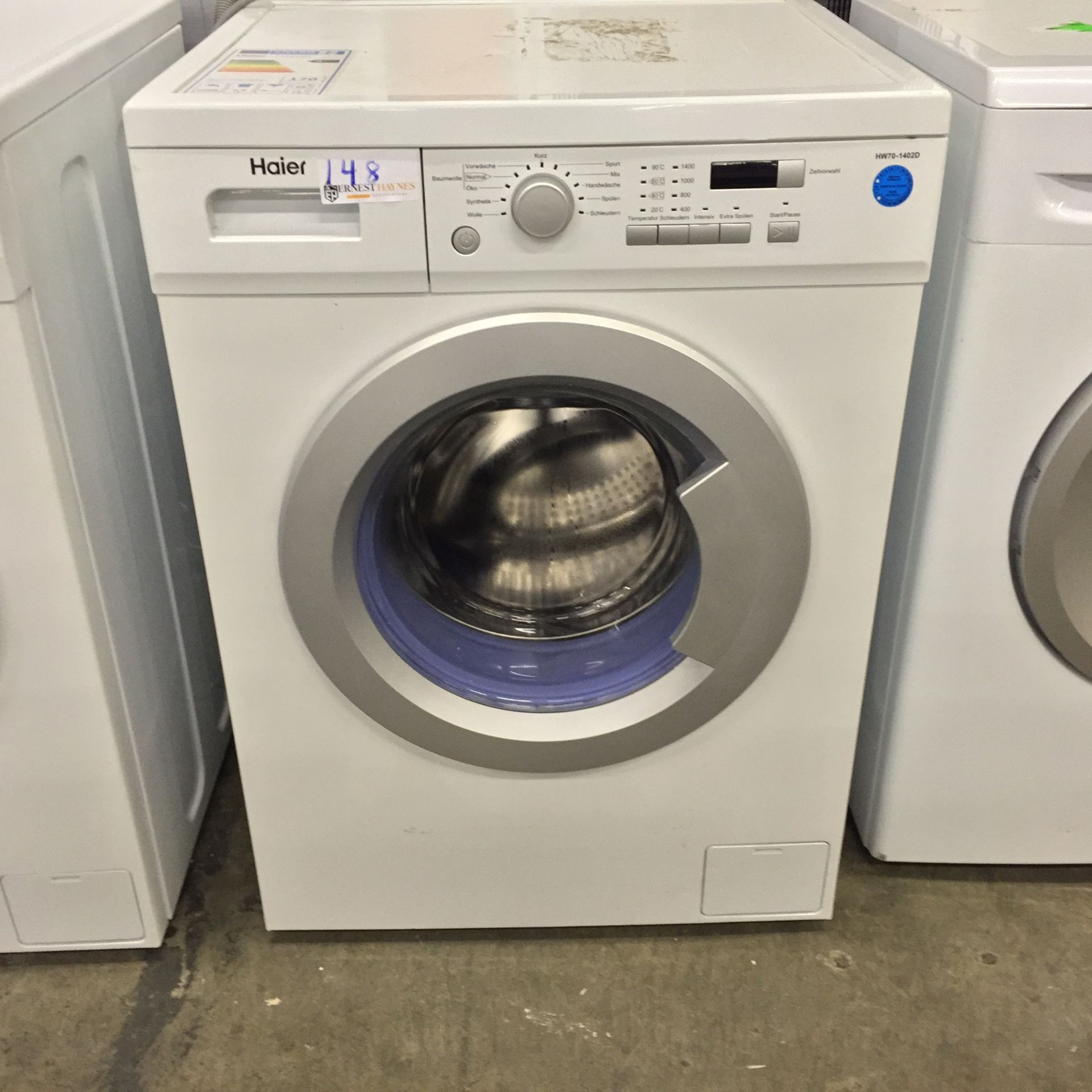 Haier Washing Machine, HW70-1402D, RRP £303.29, Powers up,