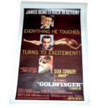 1964 - Goldfinger - US One Sheet - The US posters featured the golden girl laying across the