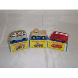 A group of three Matchbox Lesney vehicles to include a number 34 campervan, a number 49 Unimog and a