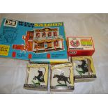 A selection of Britains Wild West toys to include a saloon kit and some horses VG in F-G boxes