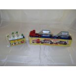 A boxed Matchbox A1 garage forecourt together with a boxed M4 Fruehauf Hopper Train. G-VG in G boxes