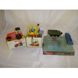 A group of Dinky toys to include a boxed Dinky Aveling-Darford Diesel Roller, a boxed Dinky fork