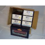 OO Gauge: A Trade Pack containing 6 Bachmann EWS mineral wagons as lotted. VG in G boxes (6 boxed
