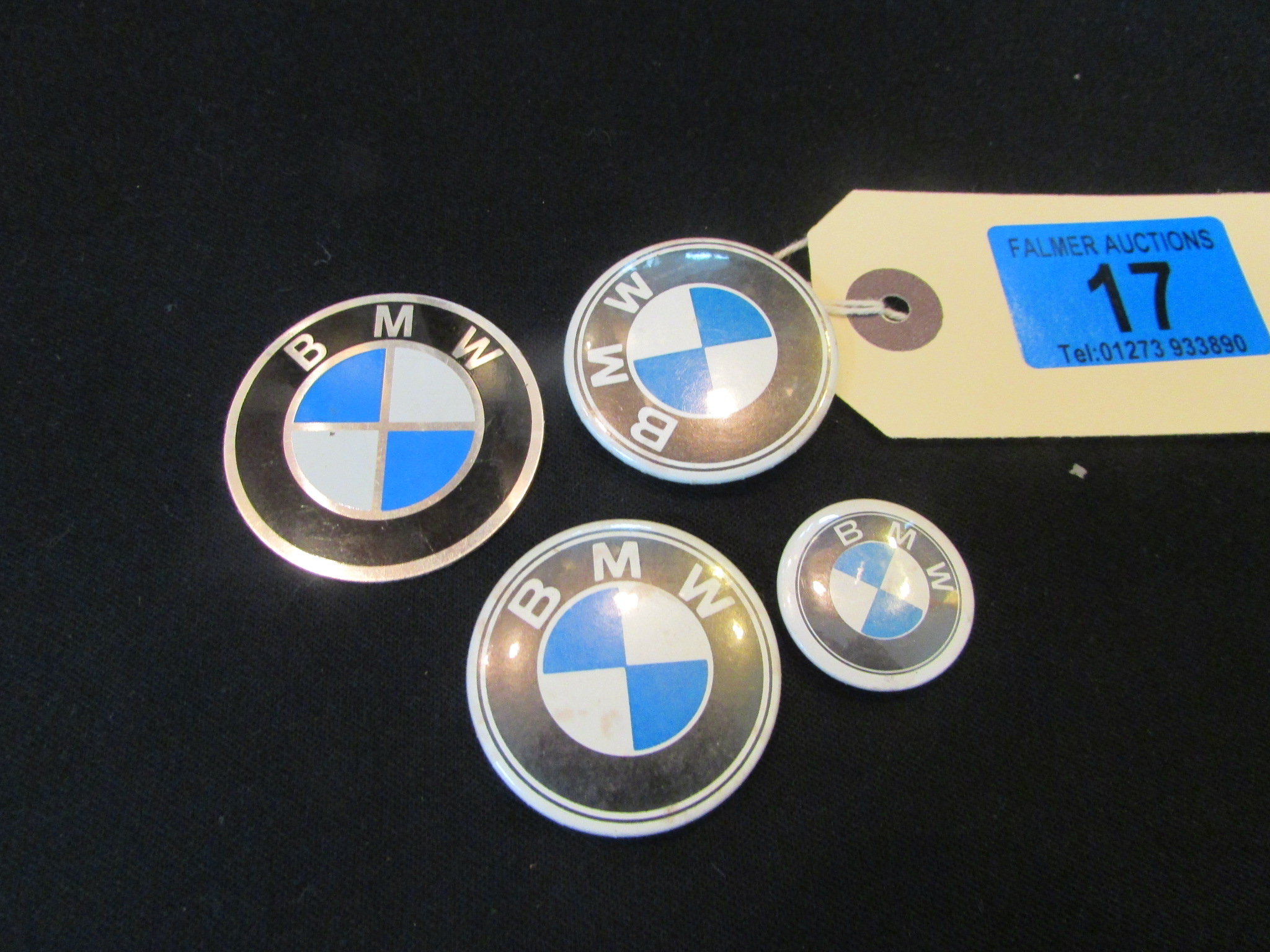 Four BMW badges, etc