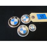 Four BMW badges, etc