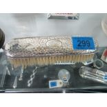 Silver clothes brush