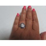 18ct white gold diamond and sapphire calibrated set cluster ring