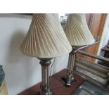 Pair of tall table lamps with shades