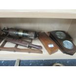 Shelf of misc. items including barometer