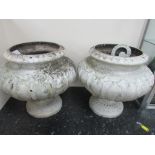 Pair of cast iron large urns