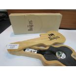 Beales watch in guitar shaped case