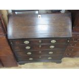 Georgian oak bureau with 4 hidden drawers