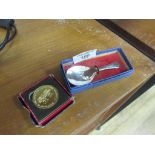 Coronation spoon and coin