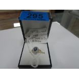 18ct gold diamond and sapphire cluster ring. 1ct sapphire 40pts diamond