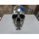 Heavy silver coloured skull head