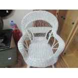 White wicker rocking chair