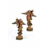 Zwei LeuchterengelAlpendländisch, 18. Jh. Holz, geschnitzt, gefasst, bemalt. Die Engel mit Flügel in