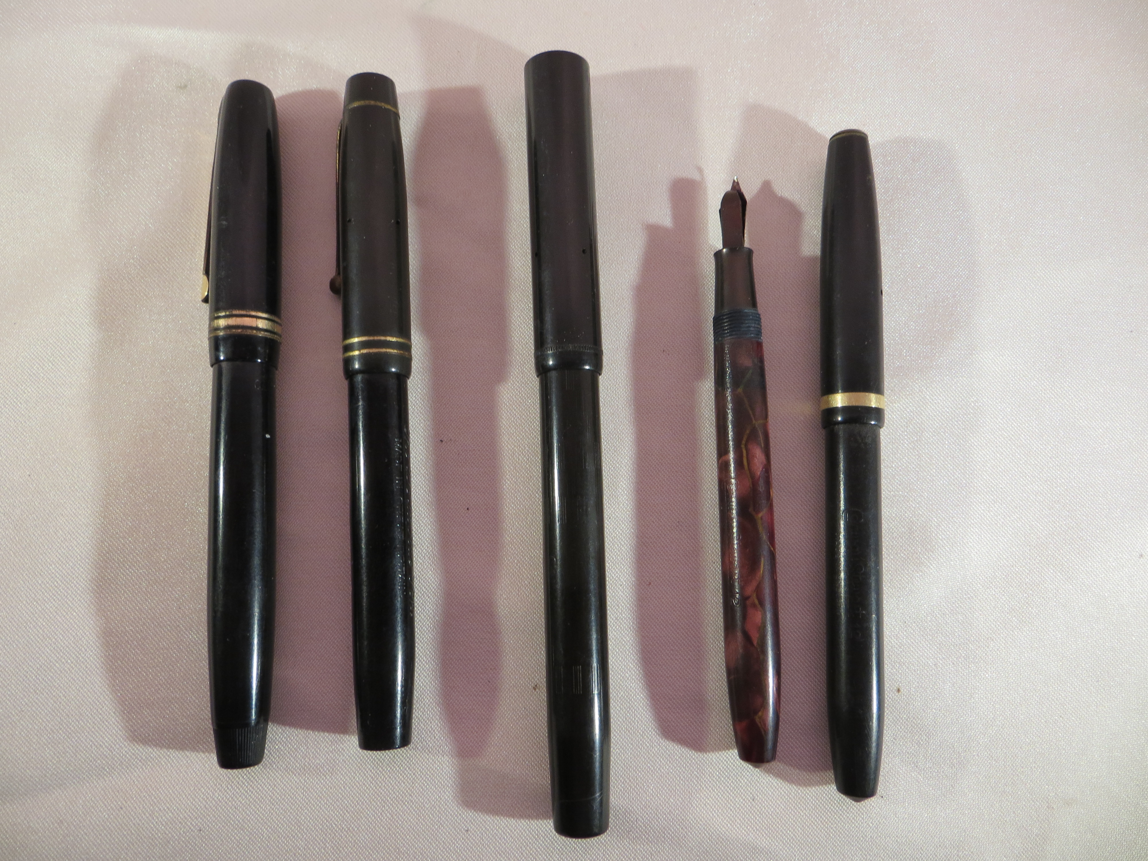 5s Assorted fountain pens all with 14ct gold nibs, including Conway Stewart, Waverley, Swan and