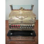 A National cash register. Working. Please note that buyer must arrange collection of this item.