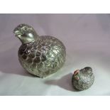 A partridge sugar shaker and a chicken trinket box.