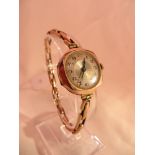 A 9ct gold cased women's Swiss made red 12 watch, 1924. Not working.