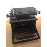 A vintage Imperial Typewriter. PLEASE NOTE THAT THIS ITEM IS EXCLUDED FROM OUR P&P SERVICE. BUYER