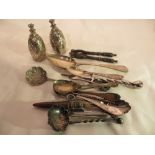 Assorted vintage flatware and pineapple salt and pepper pots.