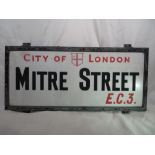 An original vintage London street sign: Mitre Street. H:30cm x W:69cm. PLEASE NOTE THAT THIS ITEM IS