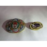 A Victorian YM and Amethyst brooch and a Victorian micro mosaic brooch.