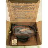 A 1942 civilian gas-mask / respirator in original box.