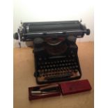 A vintage Barlock typewriter. PLEASE NOTE THAT THIS ITEM IS EXCLUDED FROM OUR P&P SERVICE. BUYER
