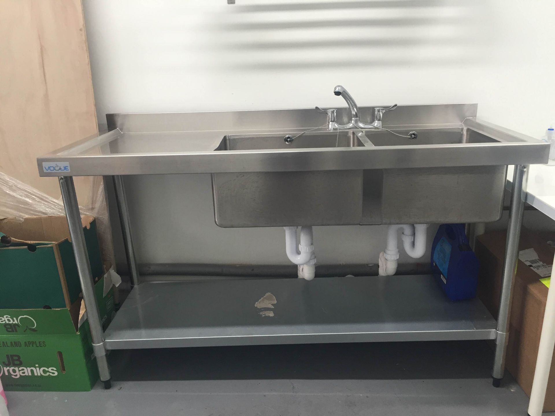 All S/S double sink with draining board. Brand new. width 1.5m x deep 600mm